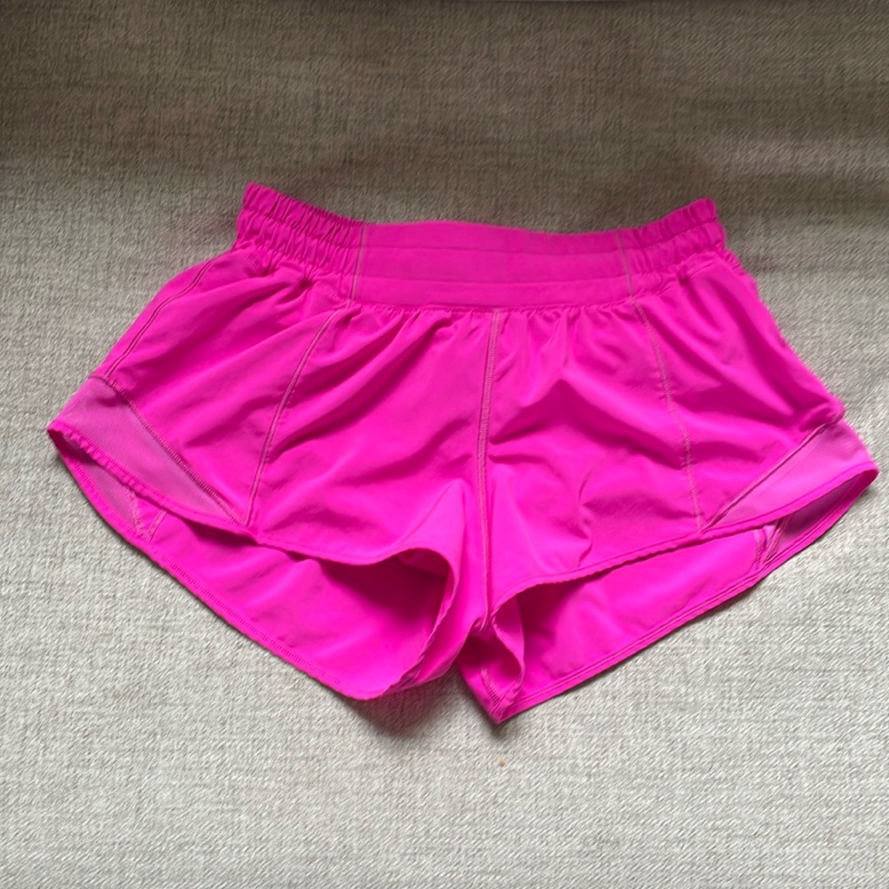 Bright pink Lululemon hotty hot shorts